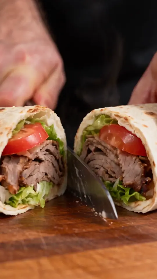 Kebab ad example: the spit, wrapped filling and the cut